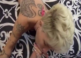 Tattooed blonde mom sucks and rides her son dick